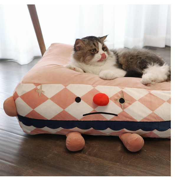 Clown Pet Sleeps In A Cozy Pet Bed  -  - Pets Crazy Shops -